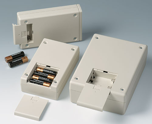 Battery compartments for AA and 9 V cells