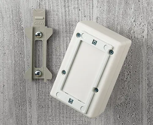 Wall suspension elements for small plastic enclosures